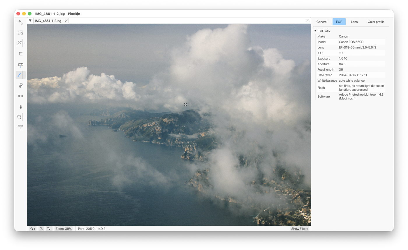 Pixeltje displaying a cloud-covered coastal landscape with its EXIF information visible.